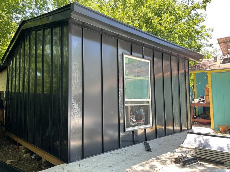 Black standing seam metal wall panels for Roof Inspection in Buford